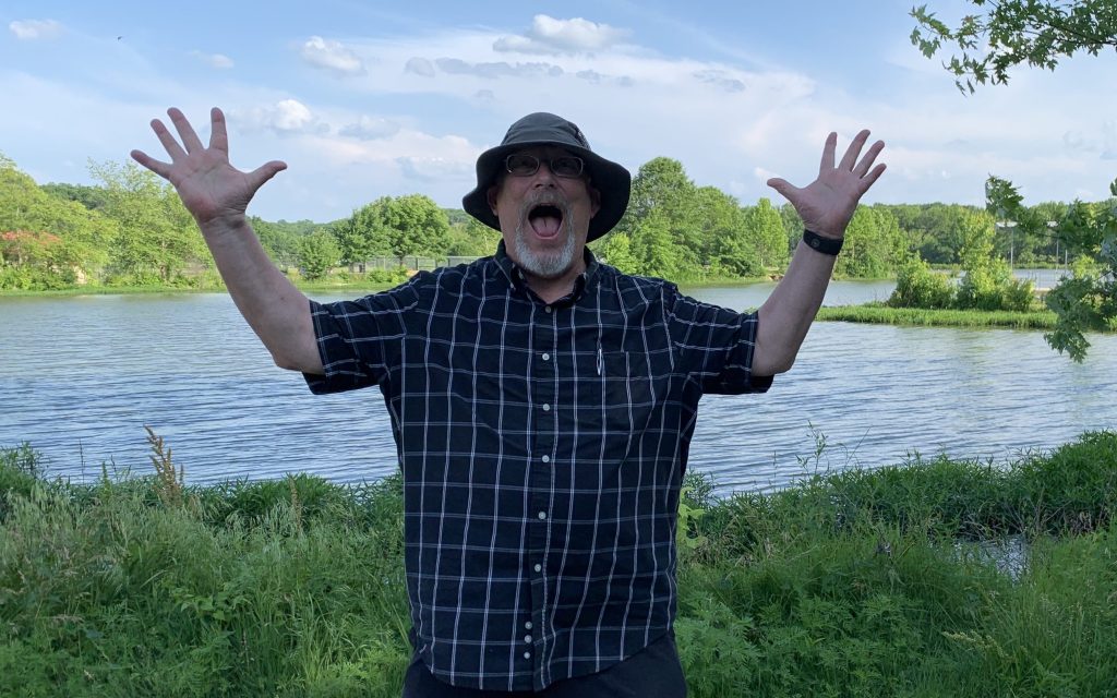 Paul Rahmoeller acting surprised while posing for a photo.