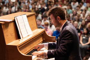 Austin McWilliams playing the piano.